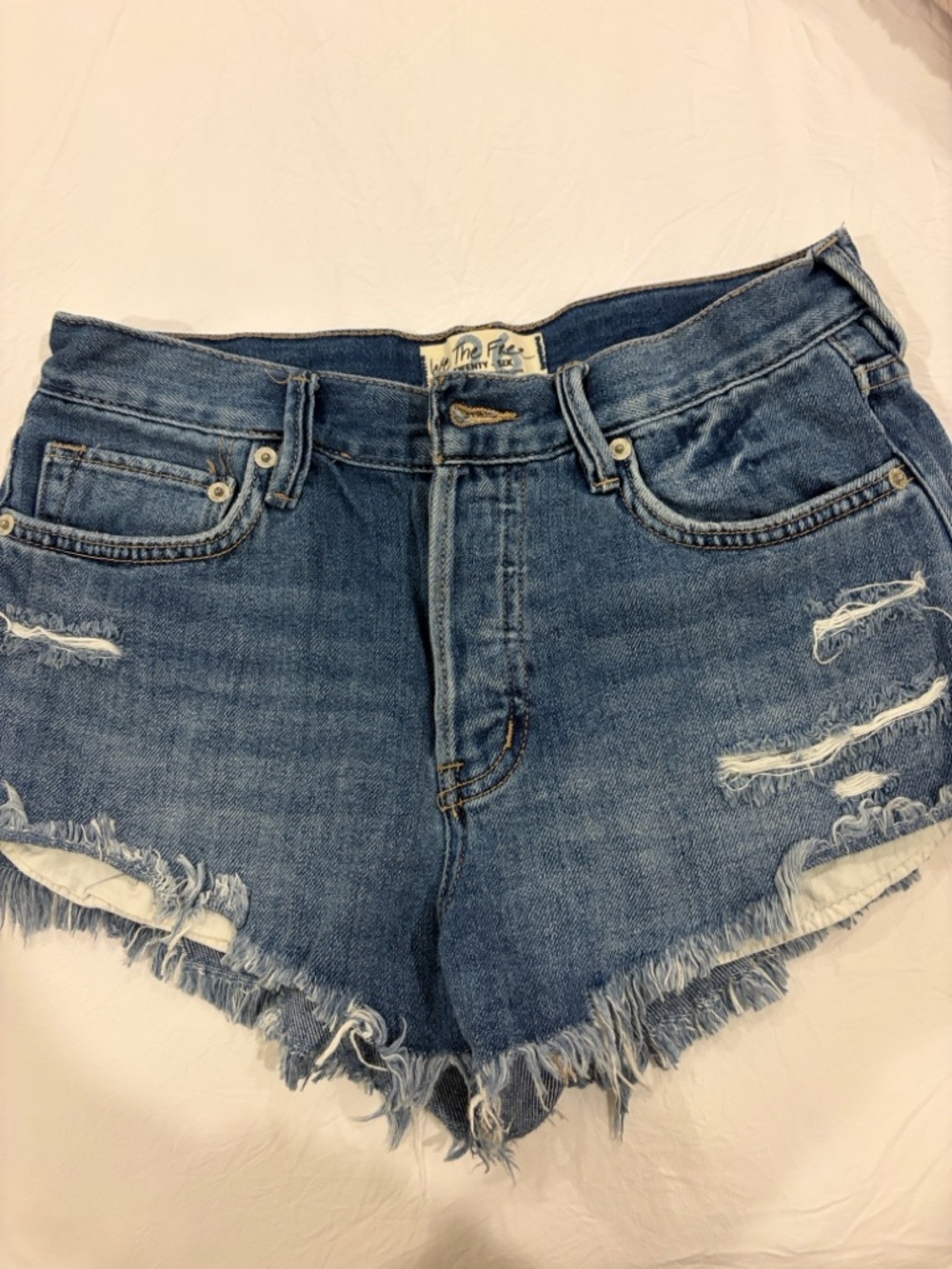 We The Free Distressed Blue Denim Cutoff Shorts